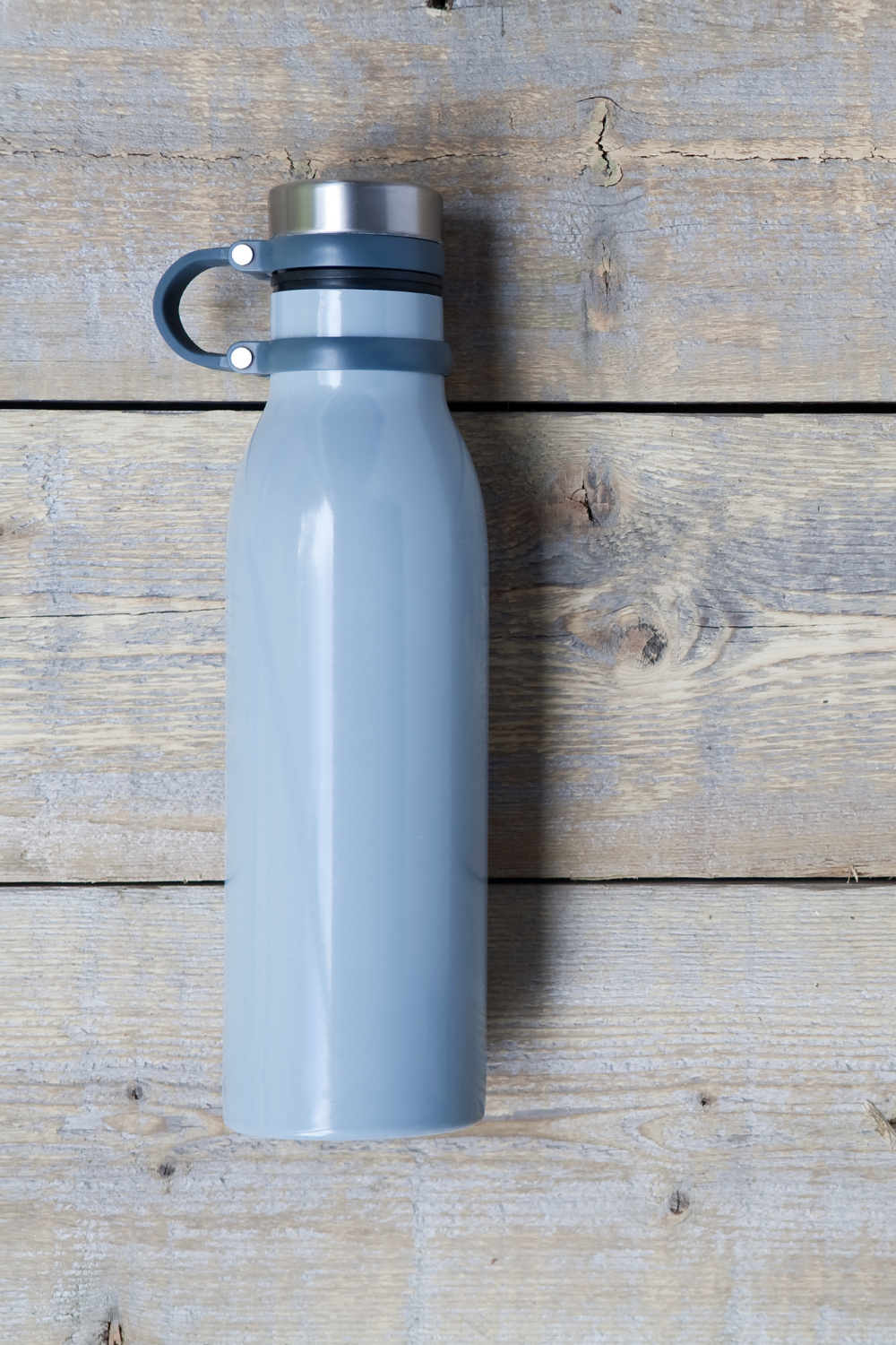Blue reusable water bottle for at home workout